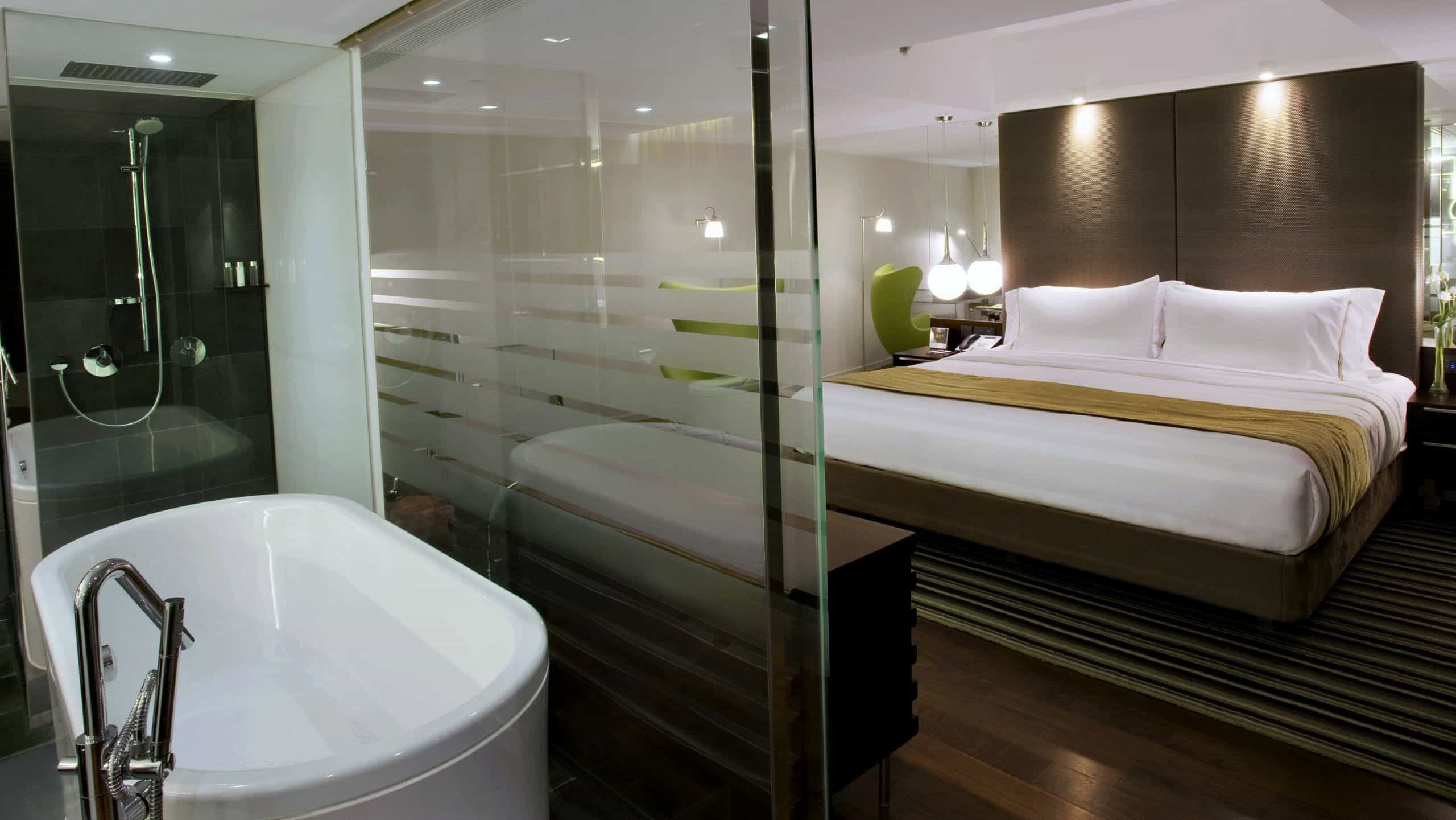 Mira Suite 100 Bathroom with Standalone Bathtub and Shower